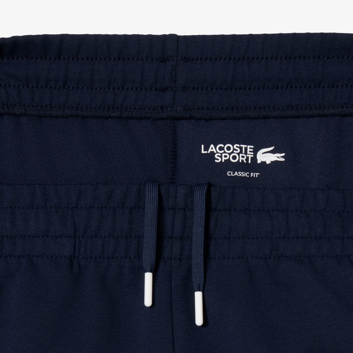 Pantalon de survêtement rayé avec logo de tennis