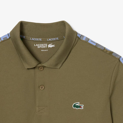 Polo de tennis à rayures Ultra Dry de marque