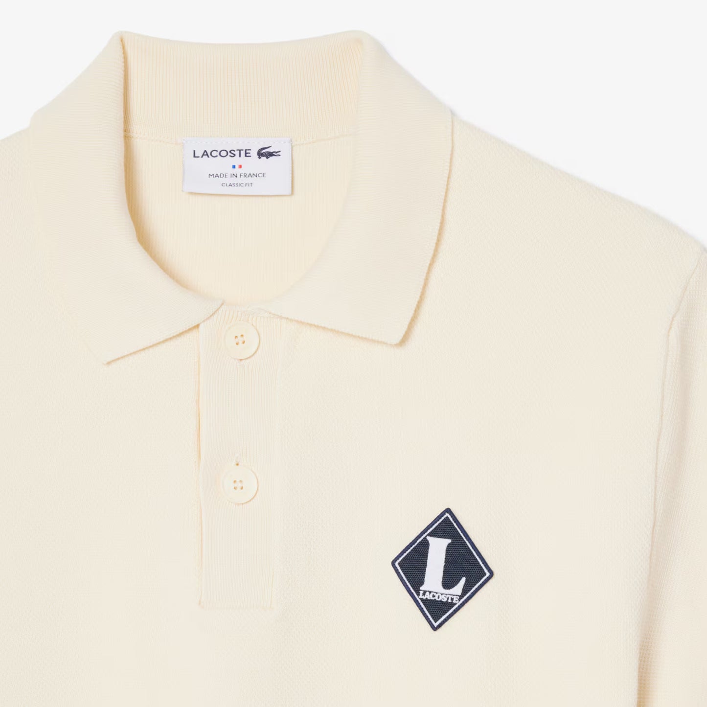 Pull ras du cou orné d'un badge Fabriqué en France