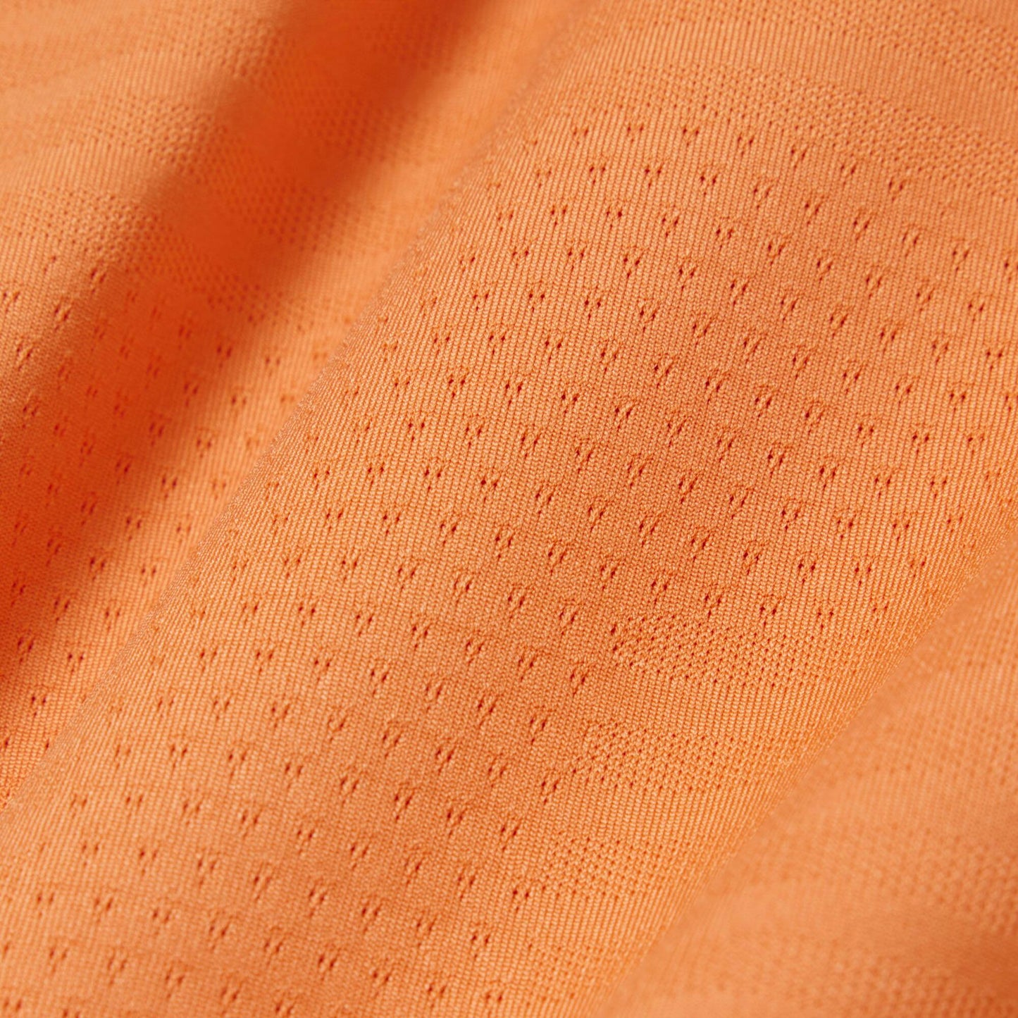 Polo de tennis en jacquard stretch ultra-respirant