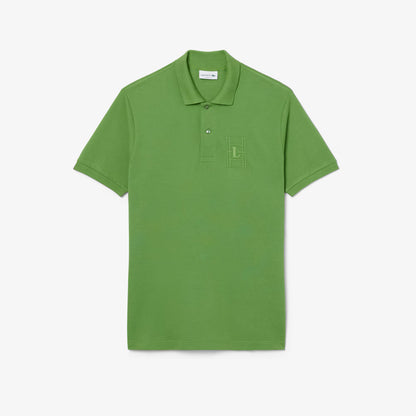 Polo en petit piqué avec broderies, coupe classique