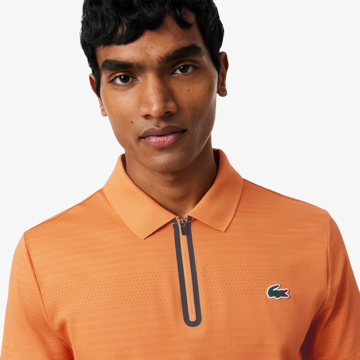Polo de tennis en jacquard stretch ultra-respirant