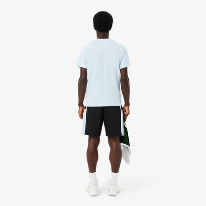 Short de tennis léger à rayures color block