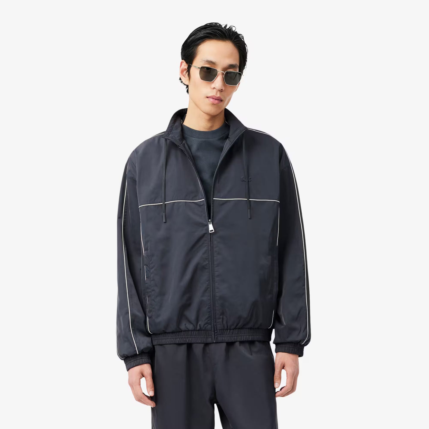Veste de survêtement imperméable avec bordure contrastante