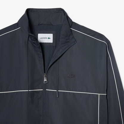Veste de survêtement imperméable avec bordure contrastante