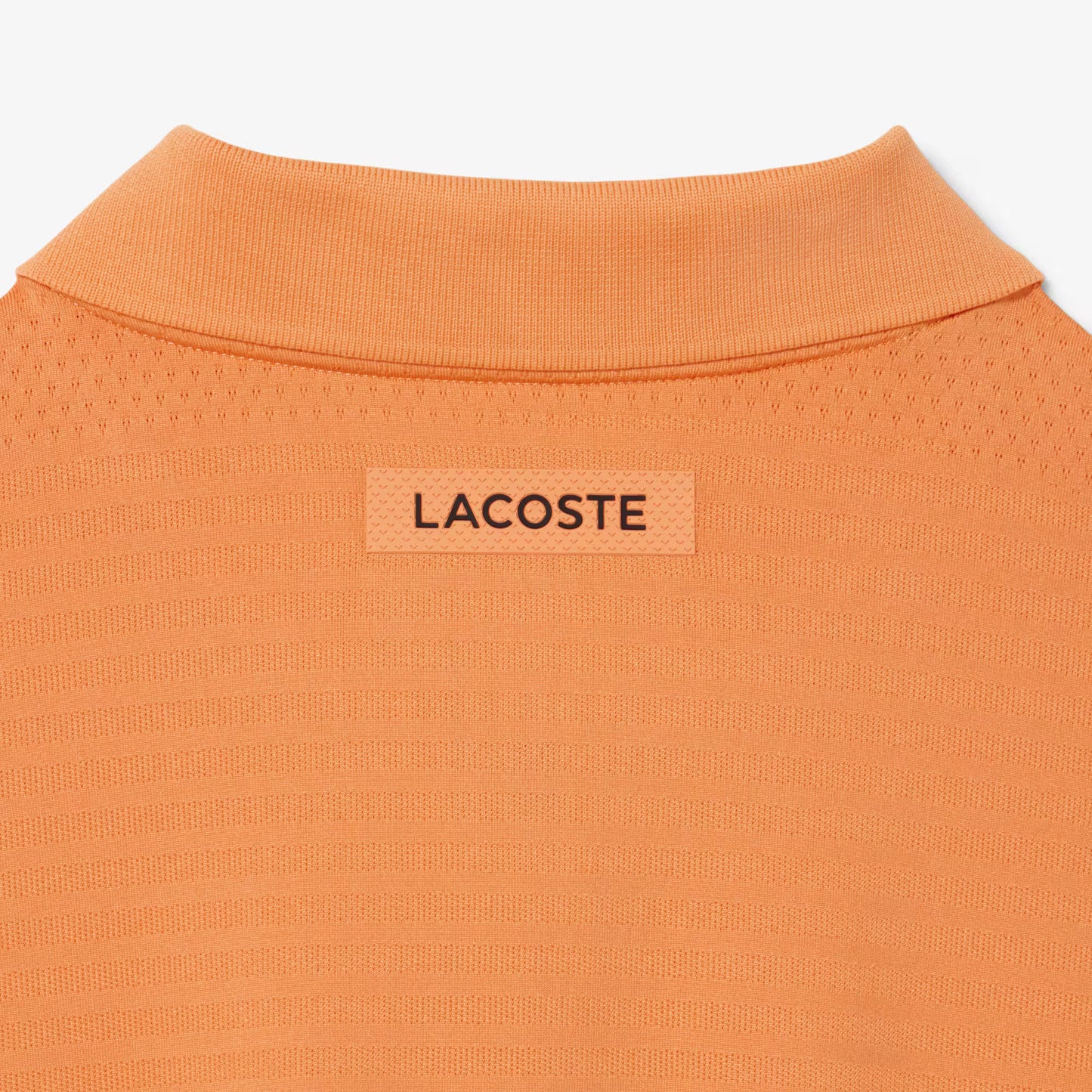 Polo de tennis en jacquard stretch ultra-respirant