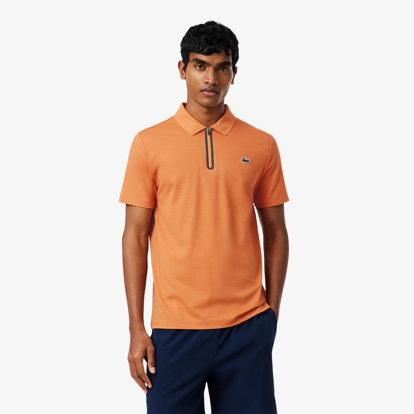 Polo de tennis en jacquard stretch ultra-respirant