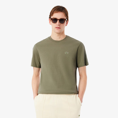 T-shirt à bande rayée griffée