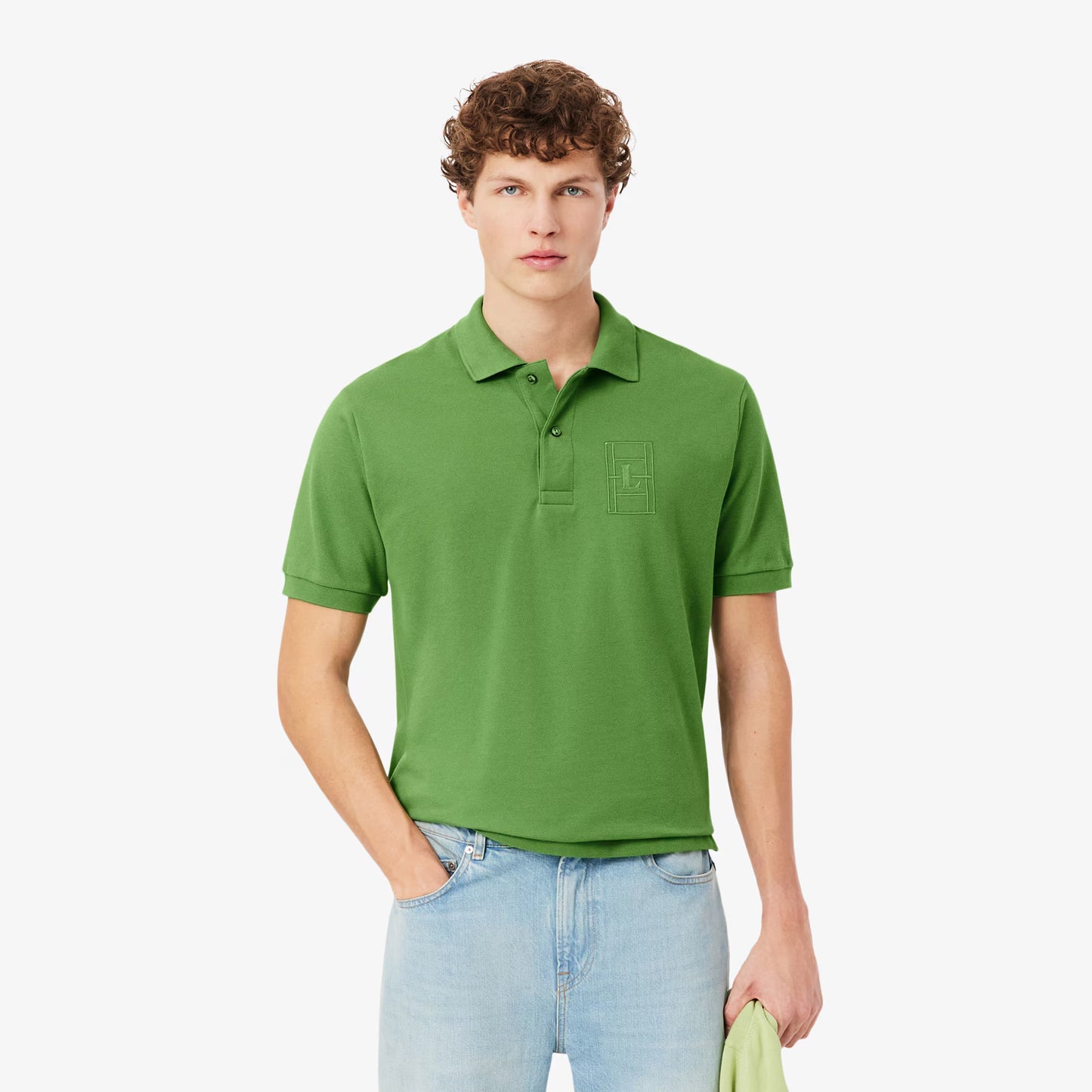 Polo en petit piqué avec broderies, coupe classique