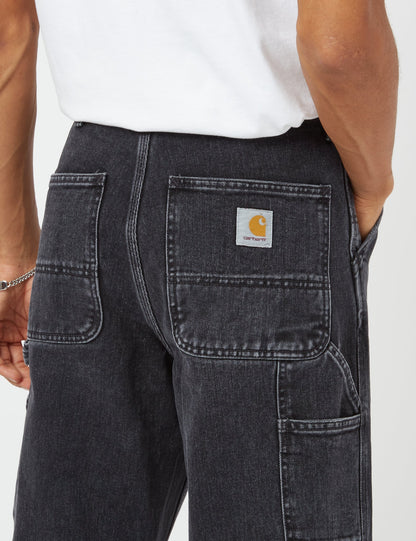 Pantalon en jean à un genou (coupe décontractée) - Noir