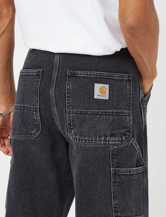 Pantalon en jean à un genou (coupe décontractée) - Noir