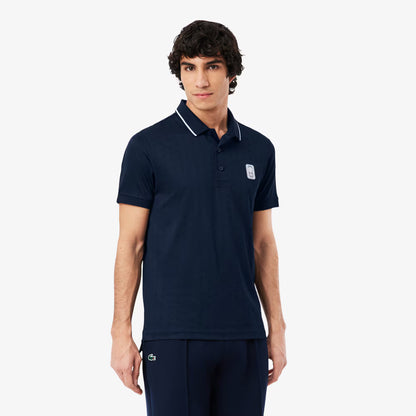 Polo en maille piquée stretch et ultra-sèche Heritage Tennis