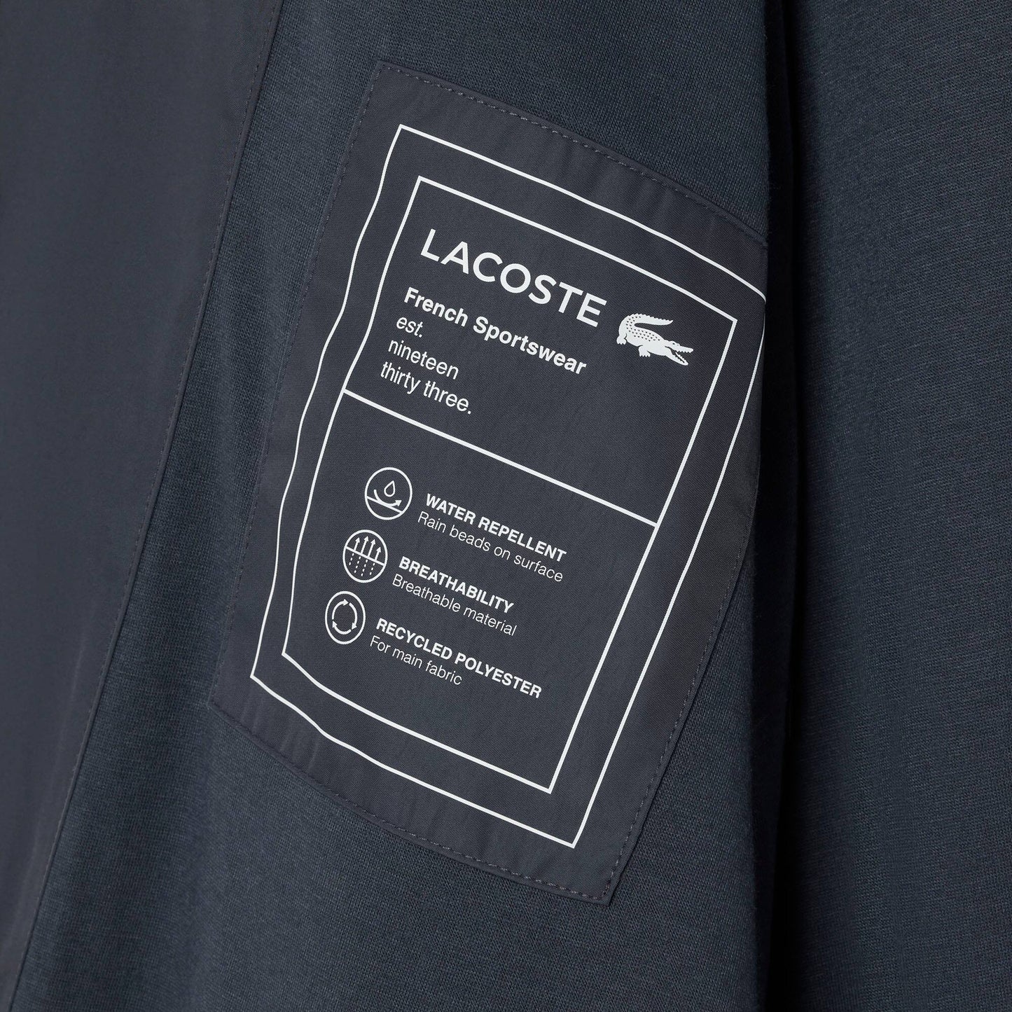 Veste de survêtement imperméable avec bordure contrastante