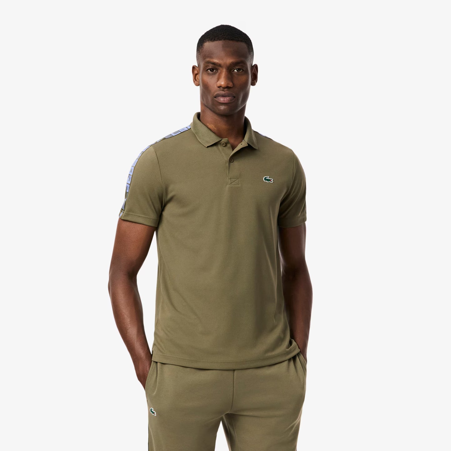 Polo de tennis à rayures Ultra Dry de marque