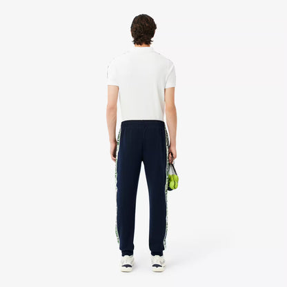 Pantalon de survêtement rayé avec logo de tennis