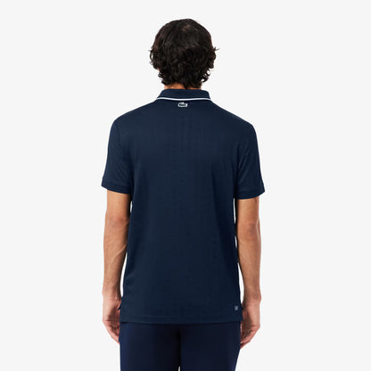 Polo en maille piquée stretch et ultra-sèche Heritage Tennis